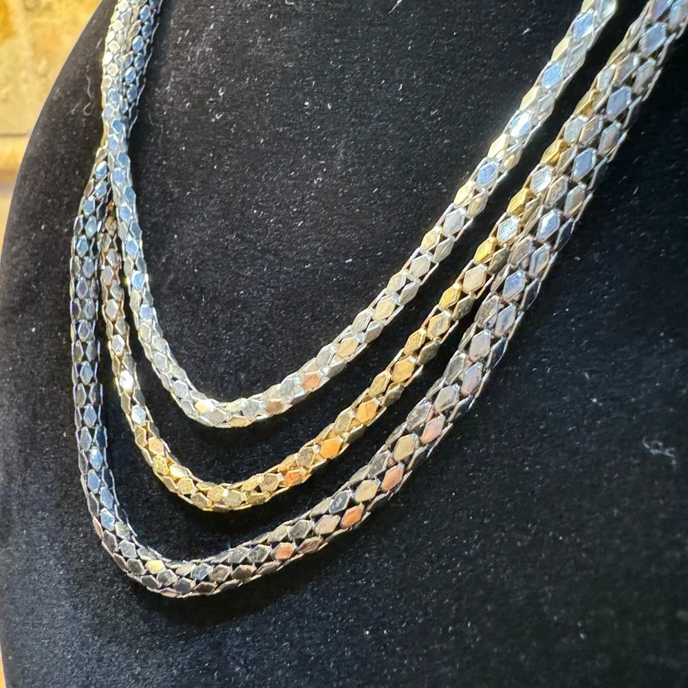Necklace 3 Strand looks like Gold Silver Platinum. 16 to 20 in adjustabl…